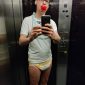 A Lift Selfie man is in the elevator.