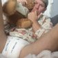 Teddy bear and a Finger Sucking Man are sitting together.